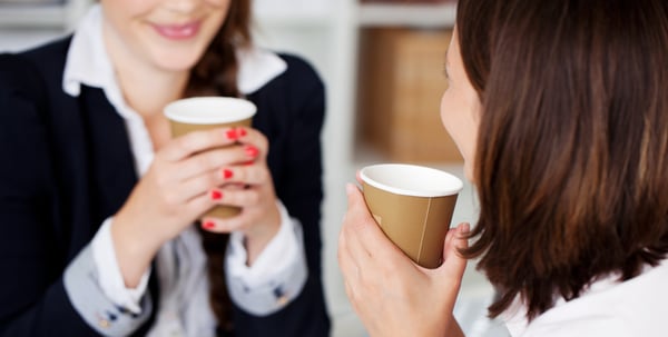 Women discussing mental health at work